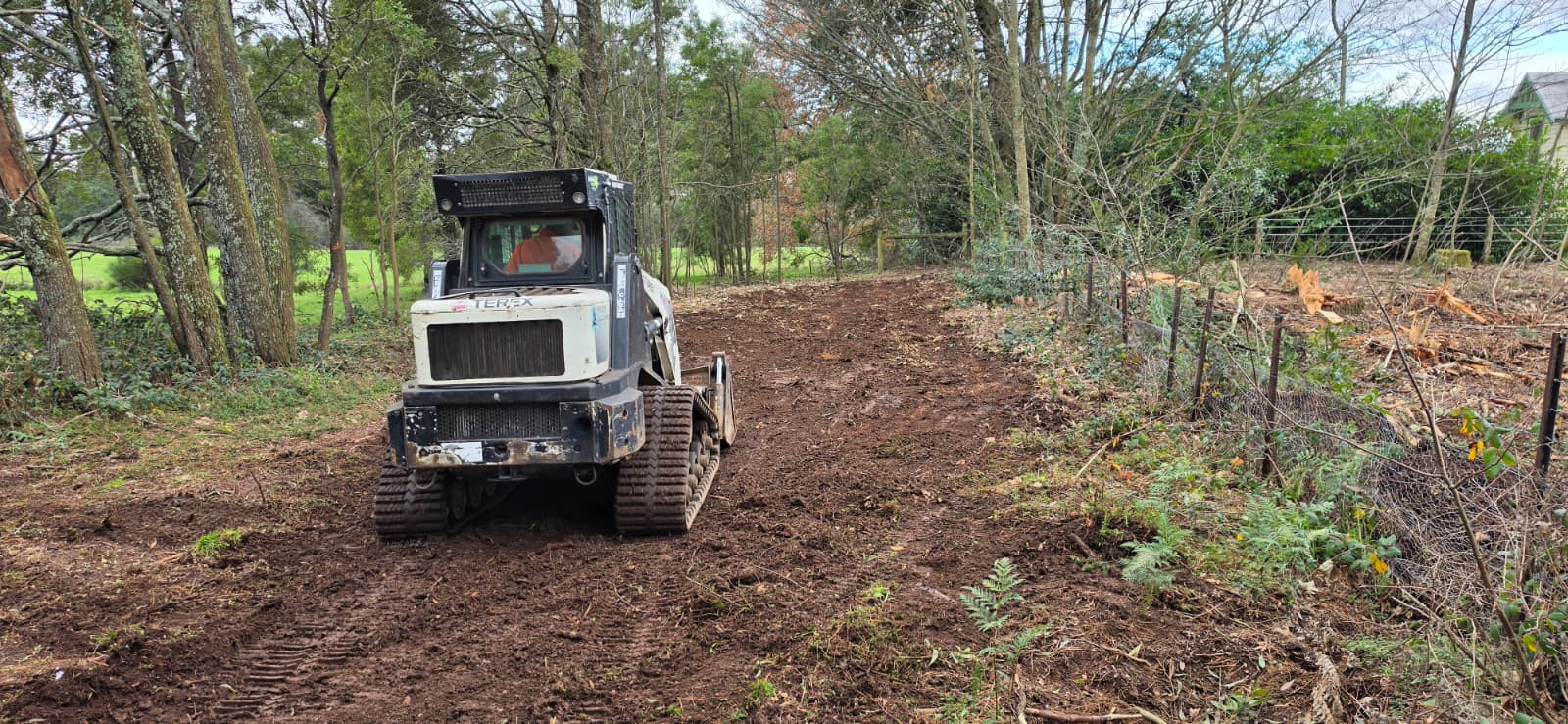 Tracked loader clearing a path at Newbury Recreation Reserve